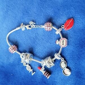 Avon Vintage Silver Tone Charm Bracelet